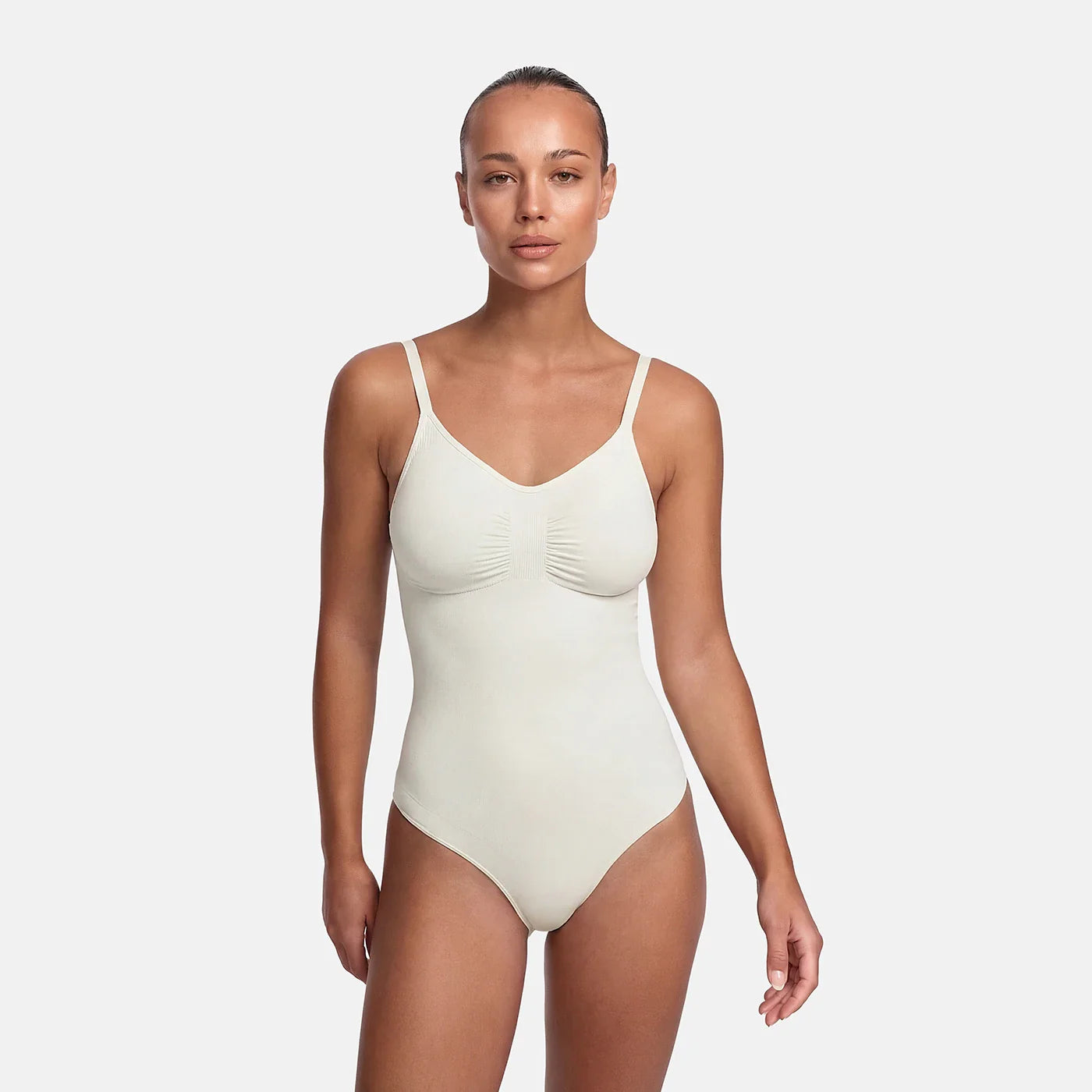 Sculpting bodysuit met string